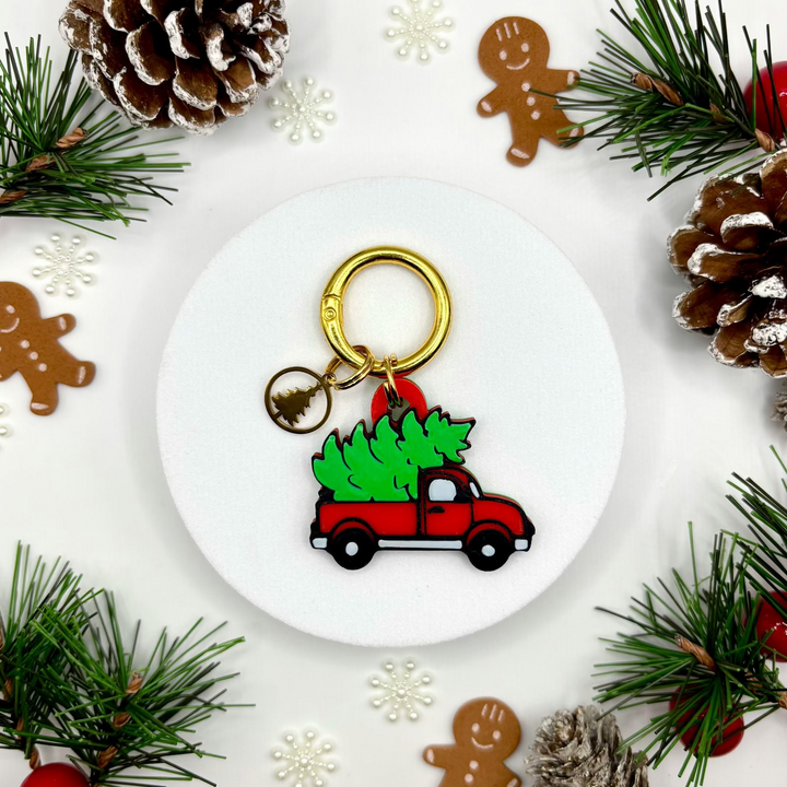 Red Truck Hauling A Christmas Tree Tag